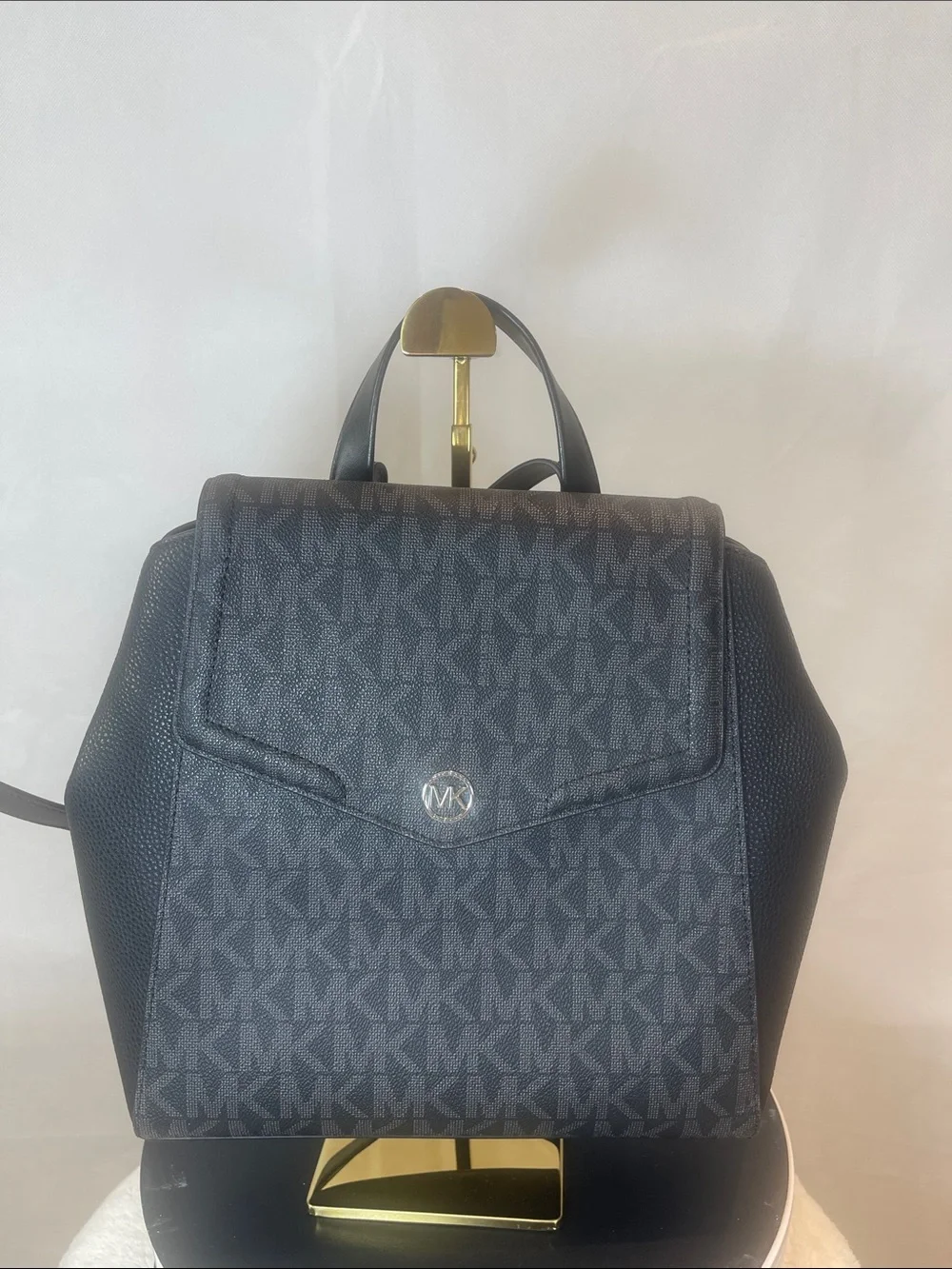 Michael Kors Black MK Logo Pattern Backpack , Size Medium.